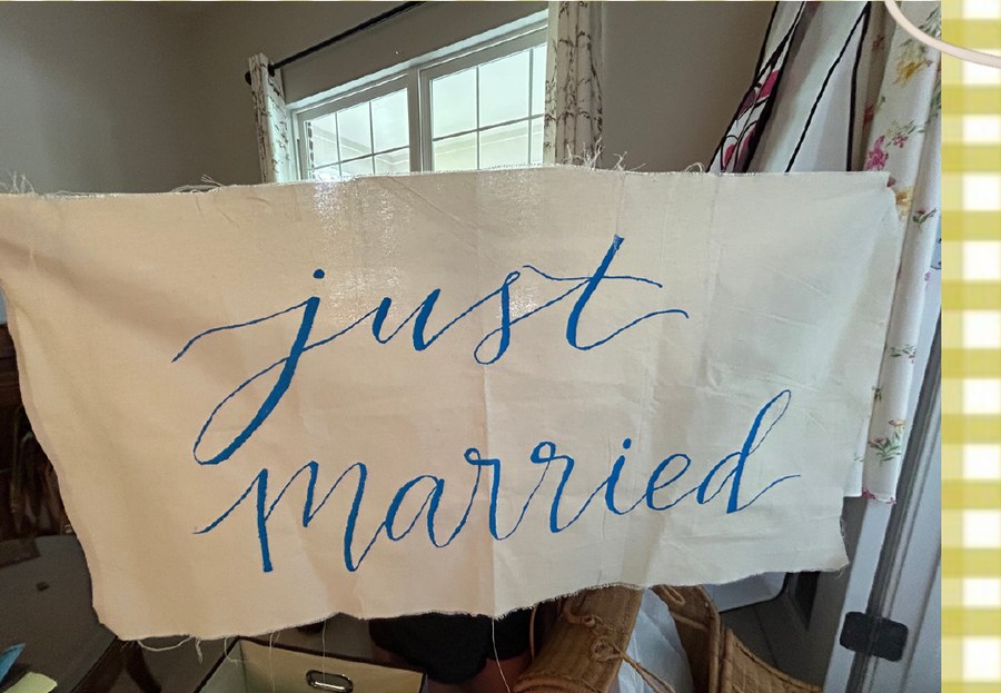 Hand-lettered Just Married linen sign