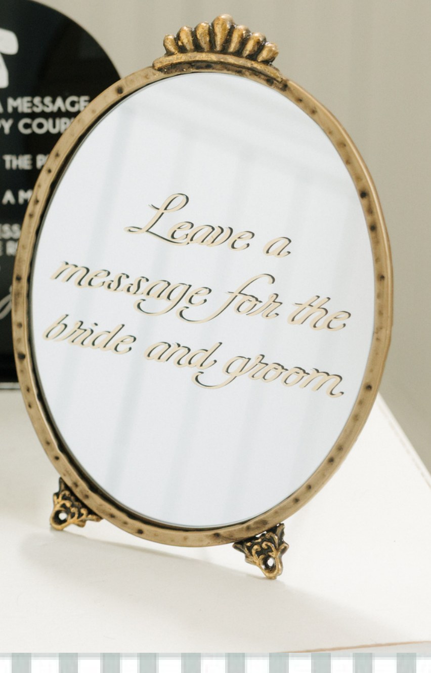 Vintage mirror sign reading Leave a Message for the Bride and Groom
