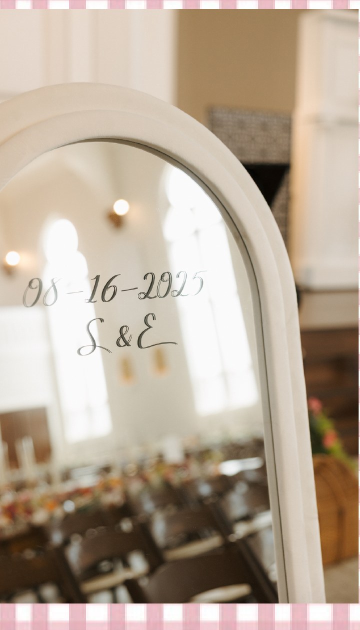 White arched mirror personalized with wedding date and initials